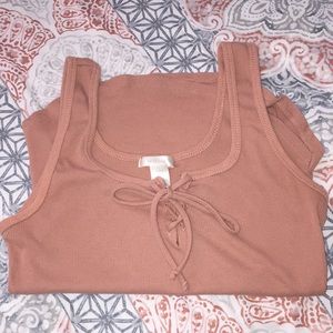 peach/pink lace up tank
